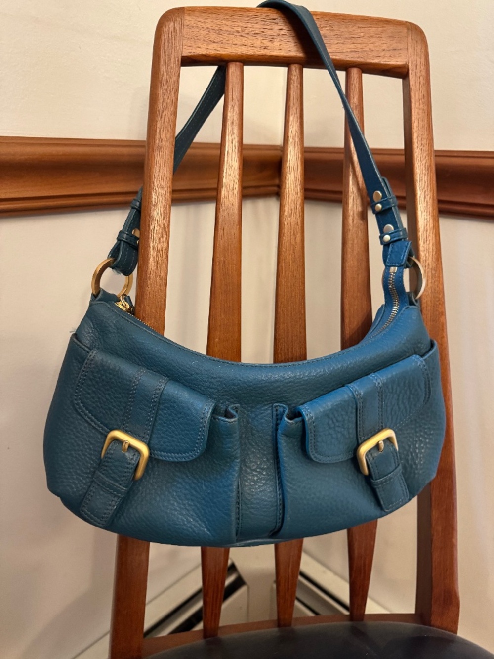 Teal blue leather handbag